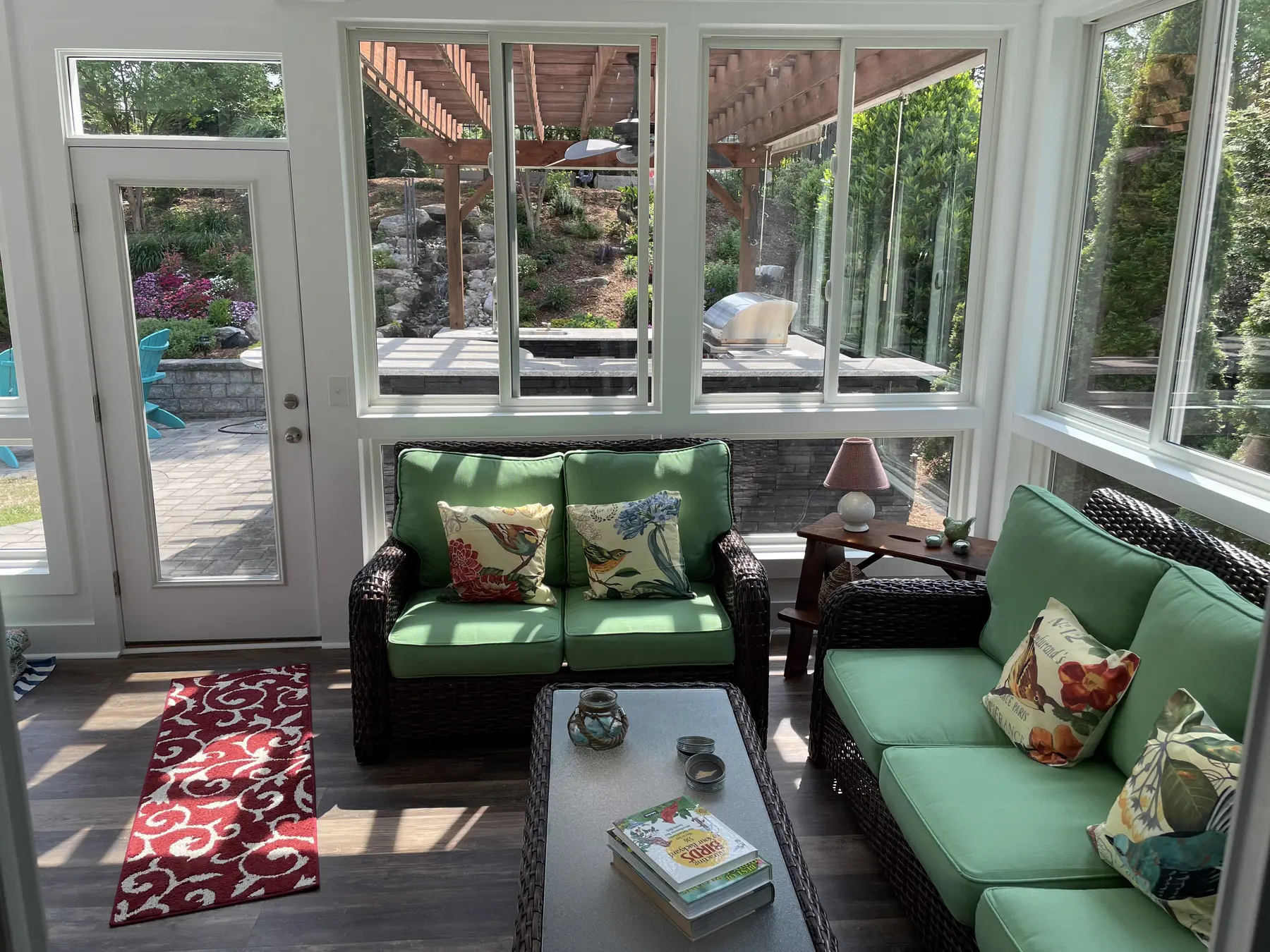 Furnished interior of the window-lined backyard addition
