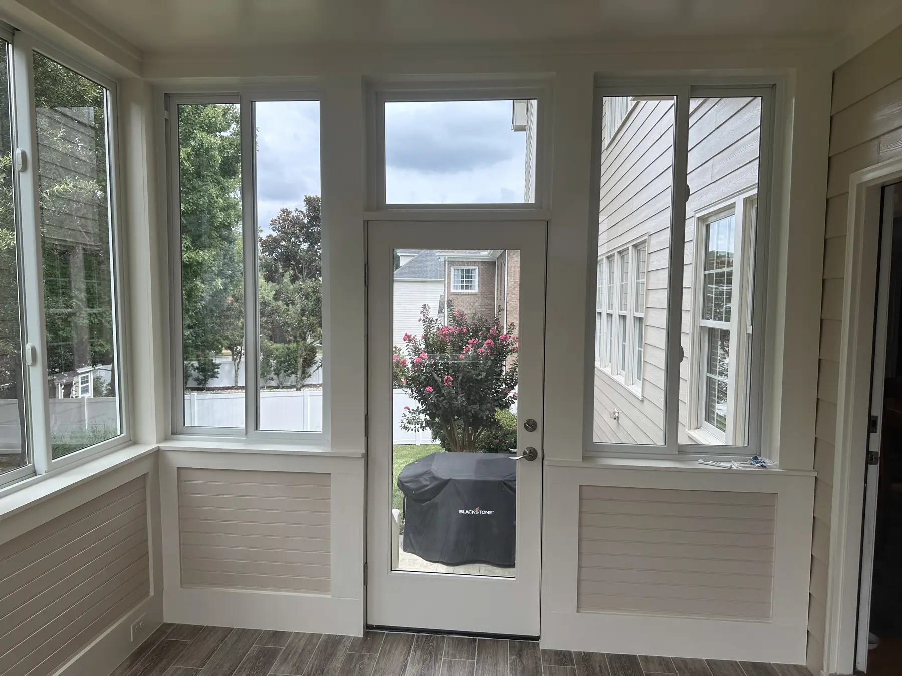 Exterior door and windows inside the completed four-season room
